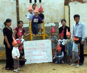 Cambodians with Thank You card