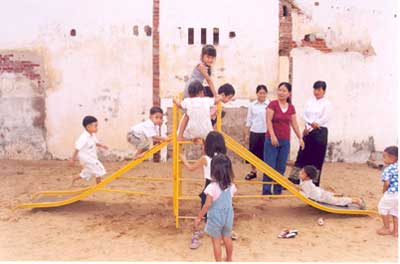 Cambodians with donated slide